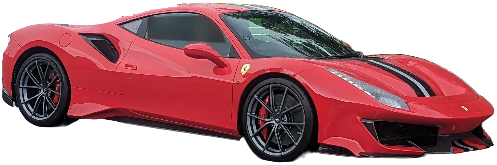 A red Ferrari 488 Pista with its center stripe