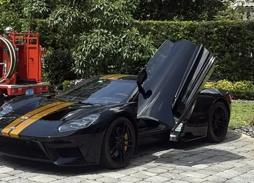 His Ford GT with the doors up